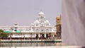 Amritsar, India Ã¢â¬â August 15, 2016: Pilgrims people walk around the Harmandir Sahib, a Sikh gurdwara - the main Sikhism holy Shri